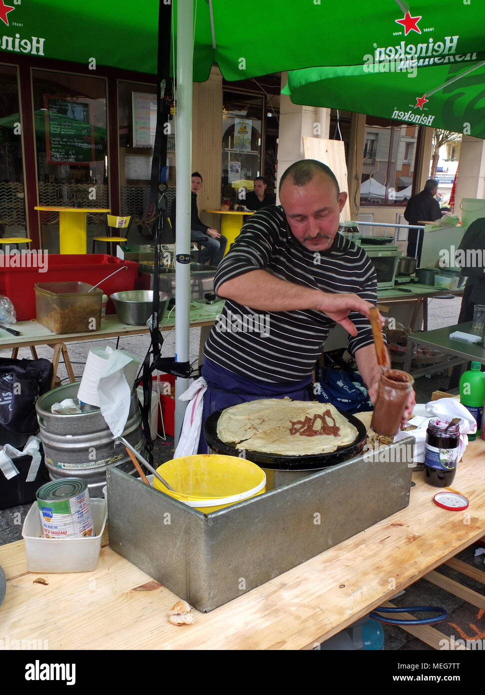 Crepe making at a busy stall in Fontenay Aux roses, just outside Paris. Stock Photo