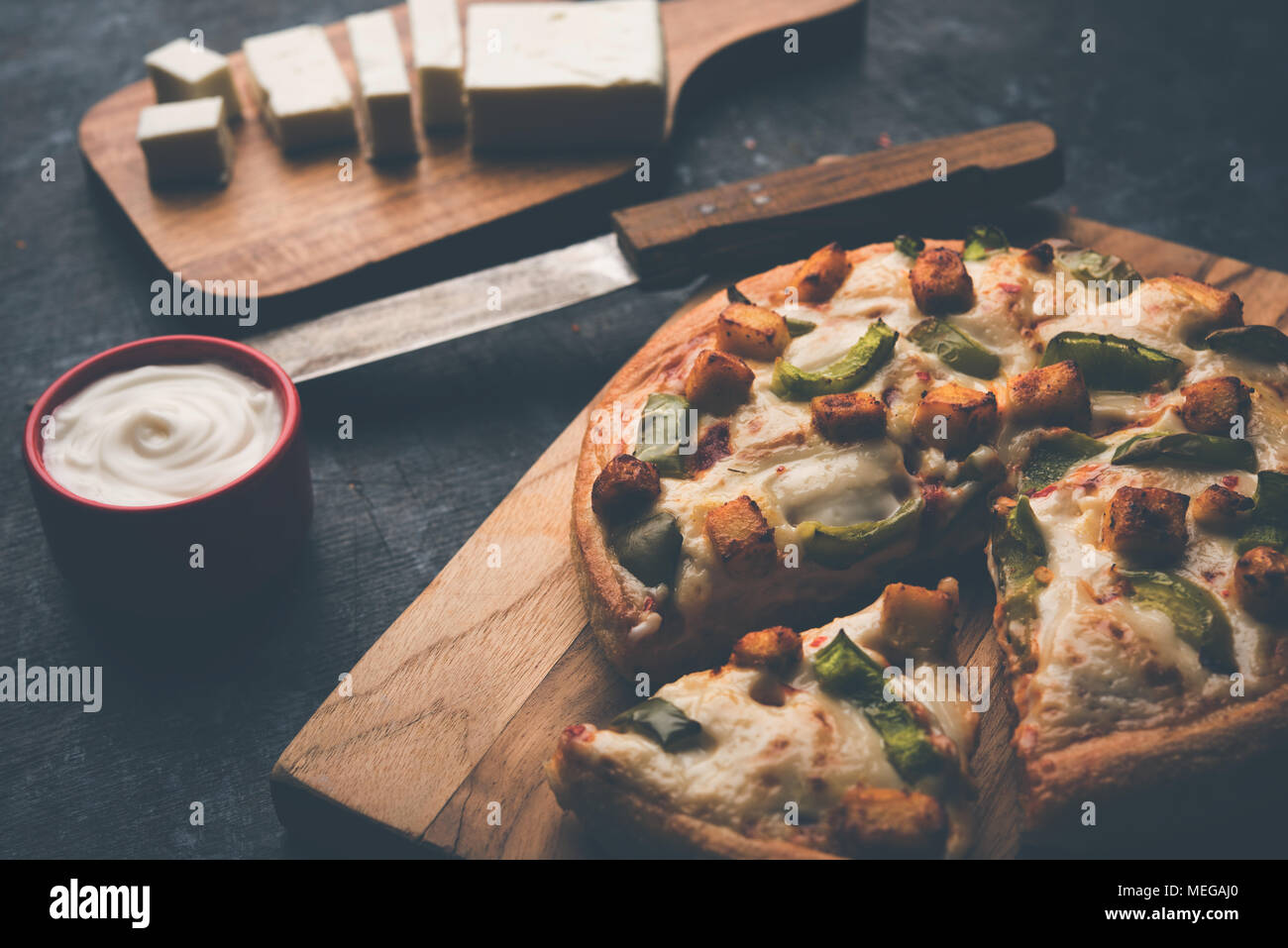 Indian Paneer Pizza With Fresh Cottage Cheese Cubes And White