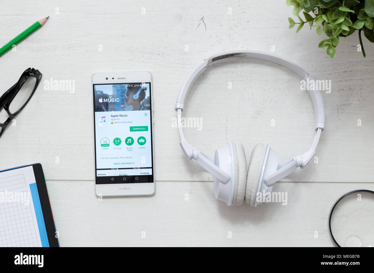 WROCLAW, POLAND - MARCH 29, 2018: Apple Music is a service that offers legal streaming music. Smartphone with Apple Music app in Google Play store on  Stock Photo