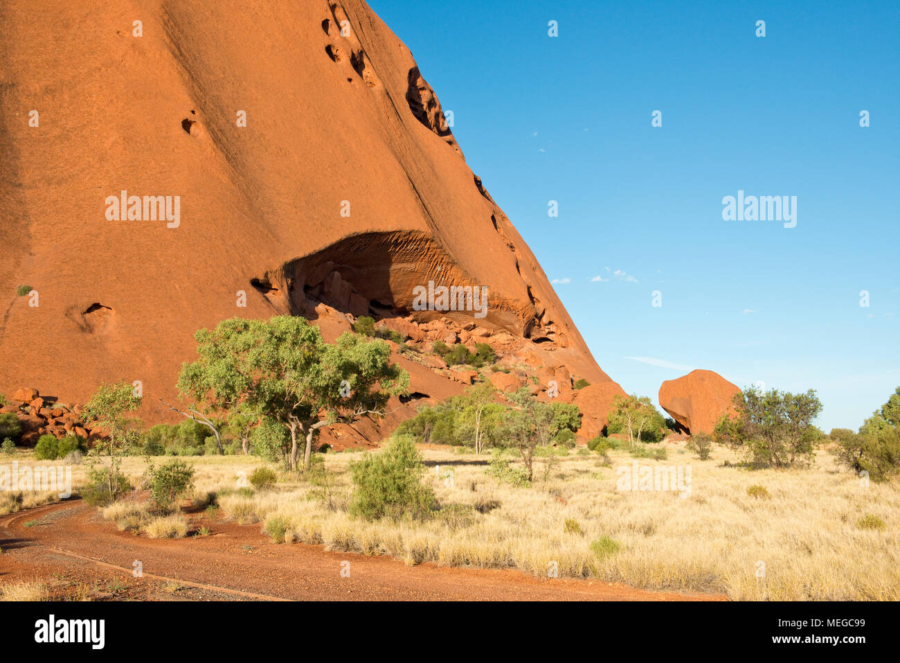 Weathered hollows and caves in the rock face of Uluru (Ayers Rock). Uluṟu-Kata Tjuṯa National Park. Northern Territory, Australia. Stock Photo