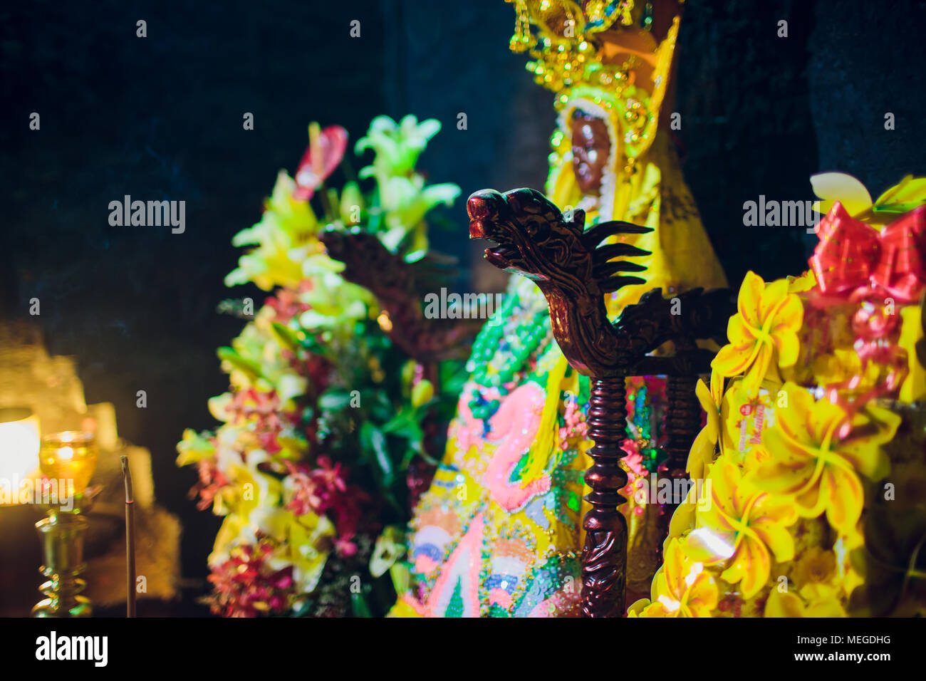 Altar At The Feet Of A Standing Buddha In A Buddhist Temple Stock