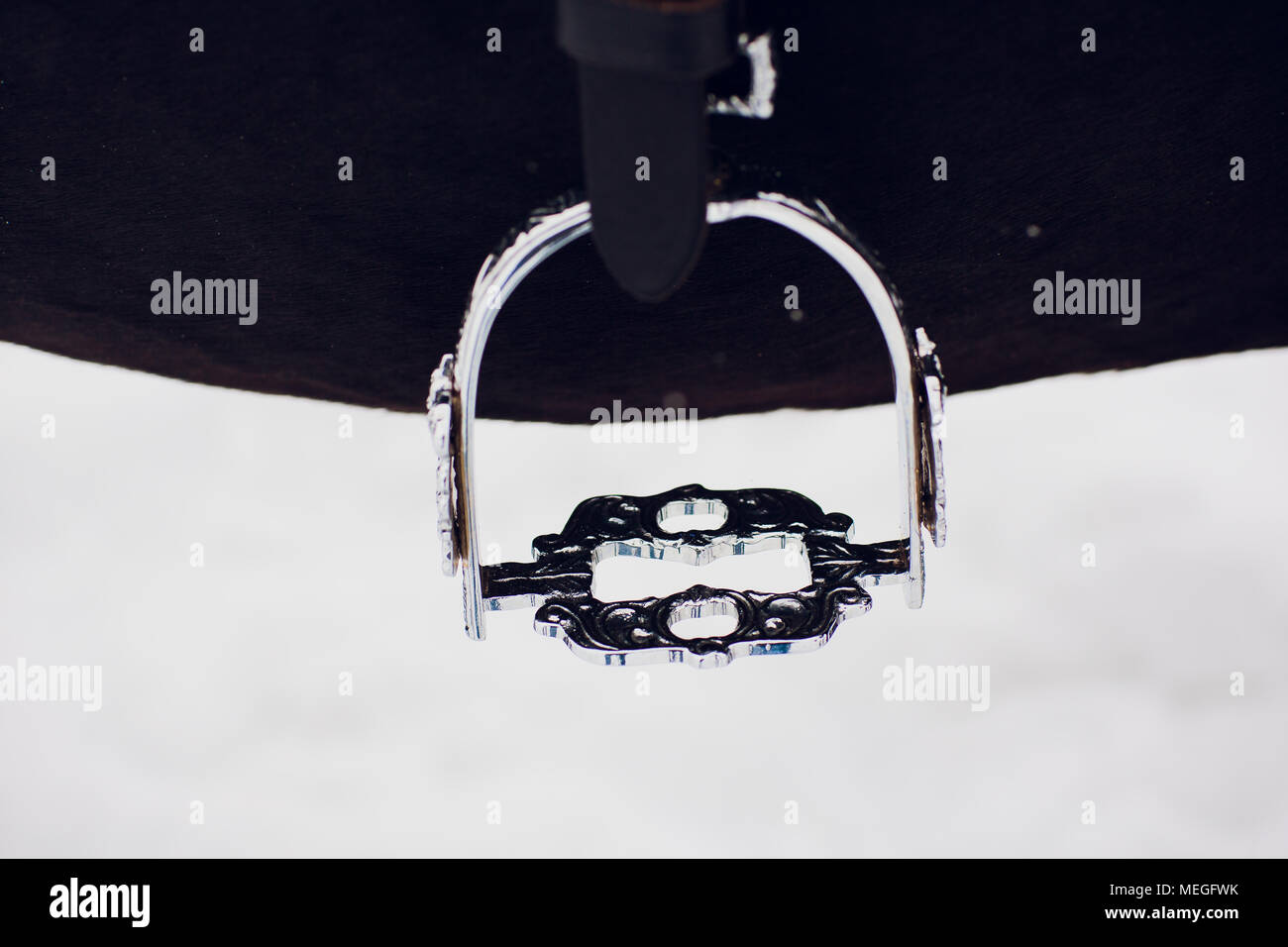 English saddle stirrup baroque type leathers and fender closeup