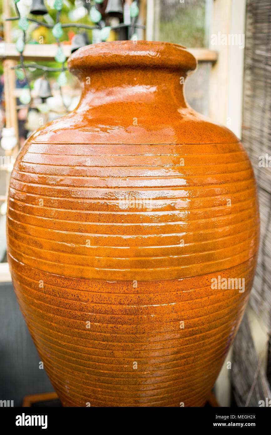 Large brown glazed terracotta pot Stock Photo Alamy