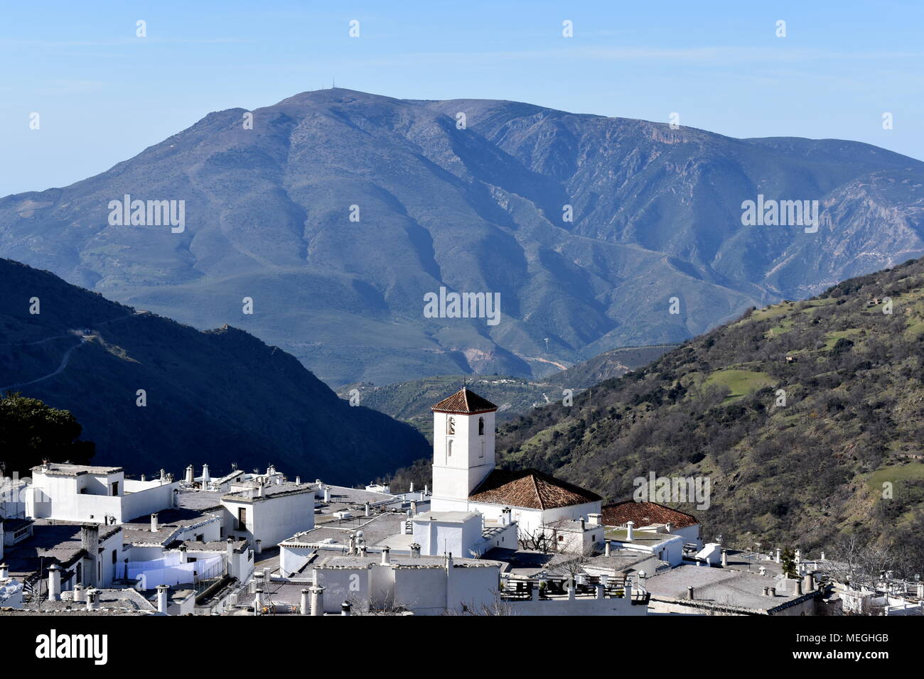 The whitewashed village of Capileira and the Poqueira valley, Las Alpujarras, Spain Stock Photo