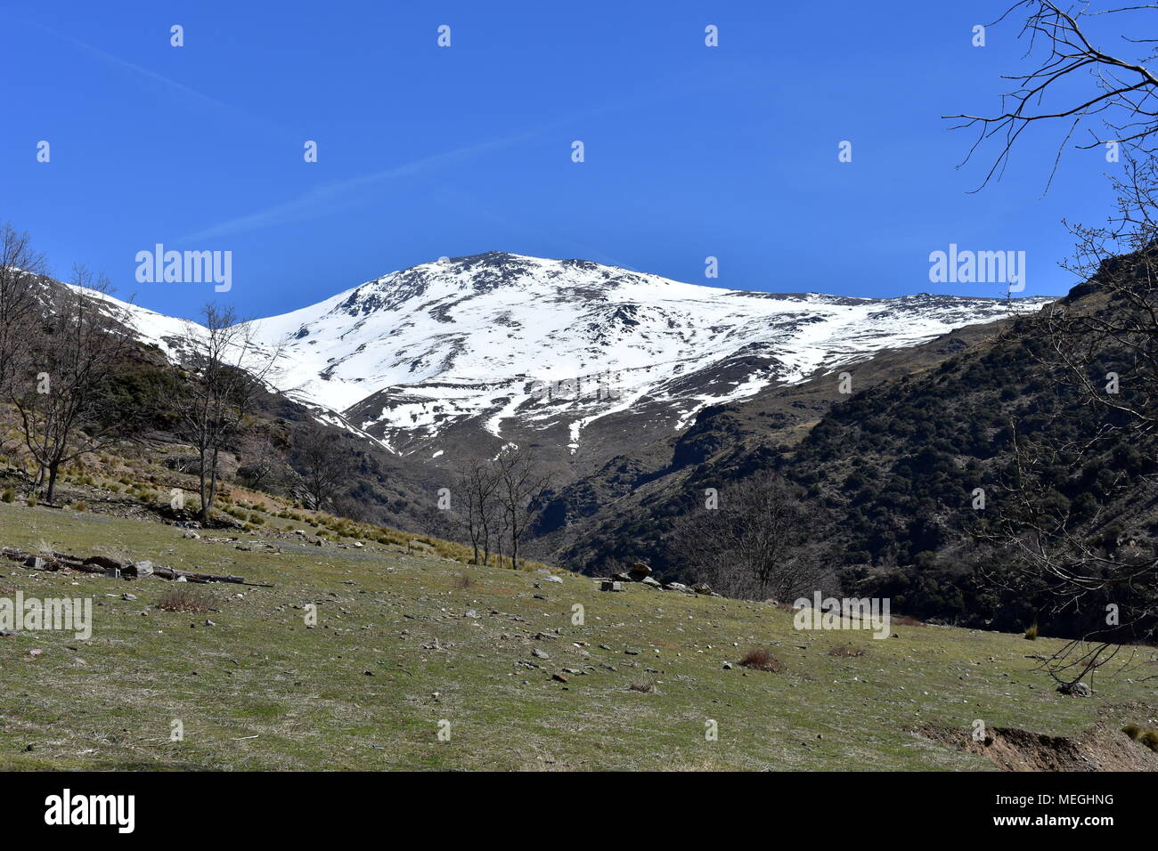 Snow capped sierra nevada mountains granada hi-res stock photography