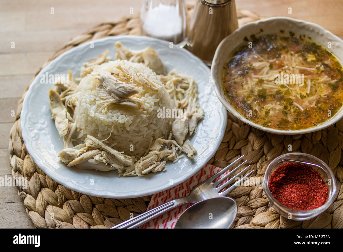 Turkish traditional chicken on a rice pilaf (tavuklu pilav) and chicken broth soup Stock Photo