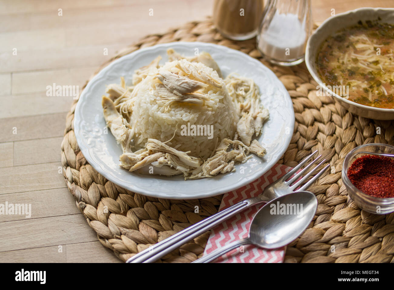 Turkish traditional chicken on a rice pilaf (tavuklu pilav) and chicken broth soup Stock Photo