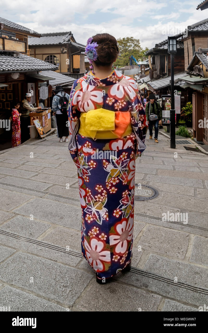 Geisha in an alley in the historic center of Kyoto, Japan Stock Photo