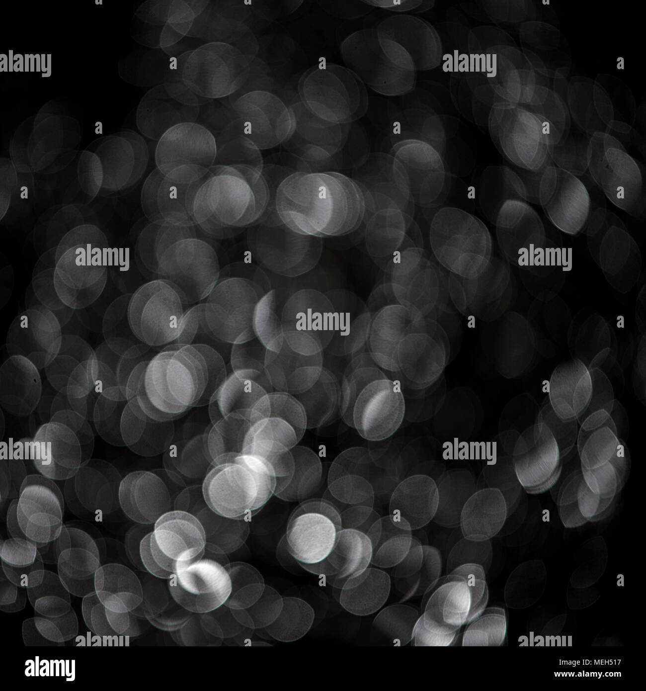 Black and white abstract background with circles of lights Stock Photo ...