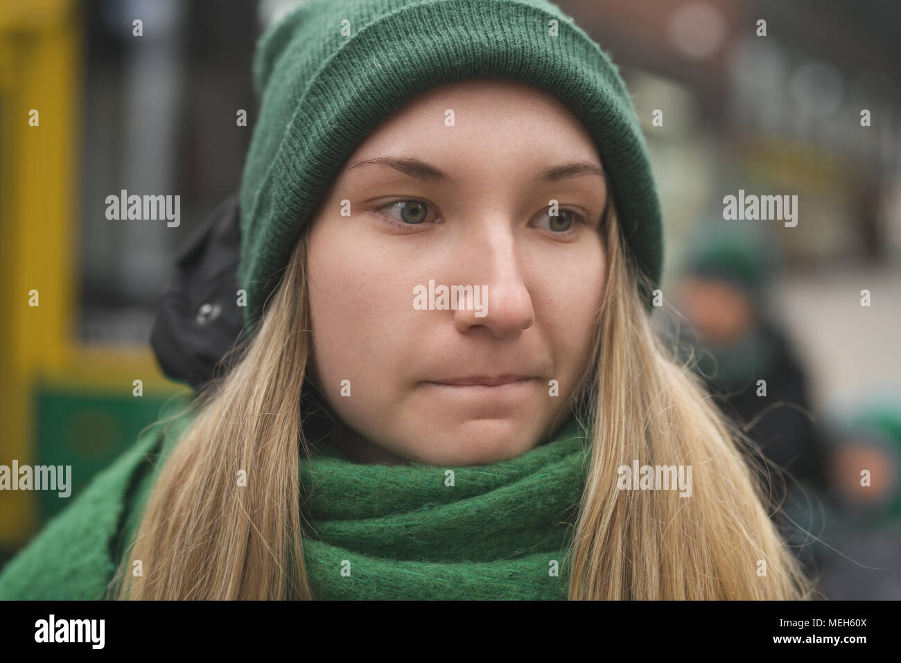 teen girl portrait on pedestrian street on a spring day thinking about ...