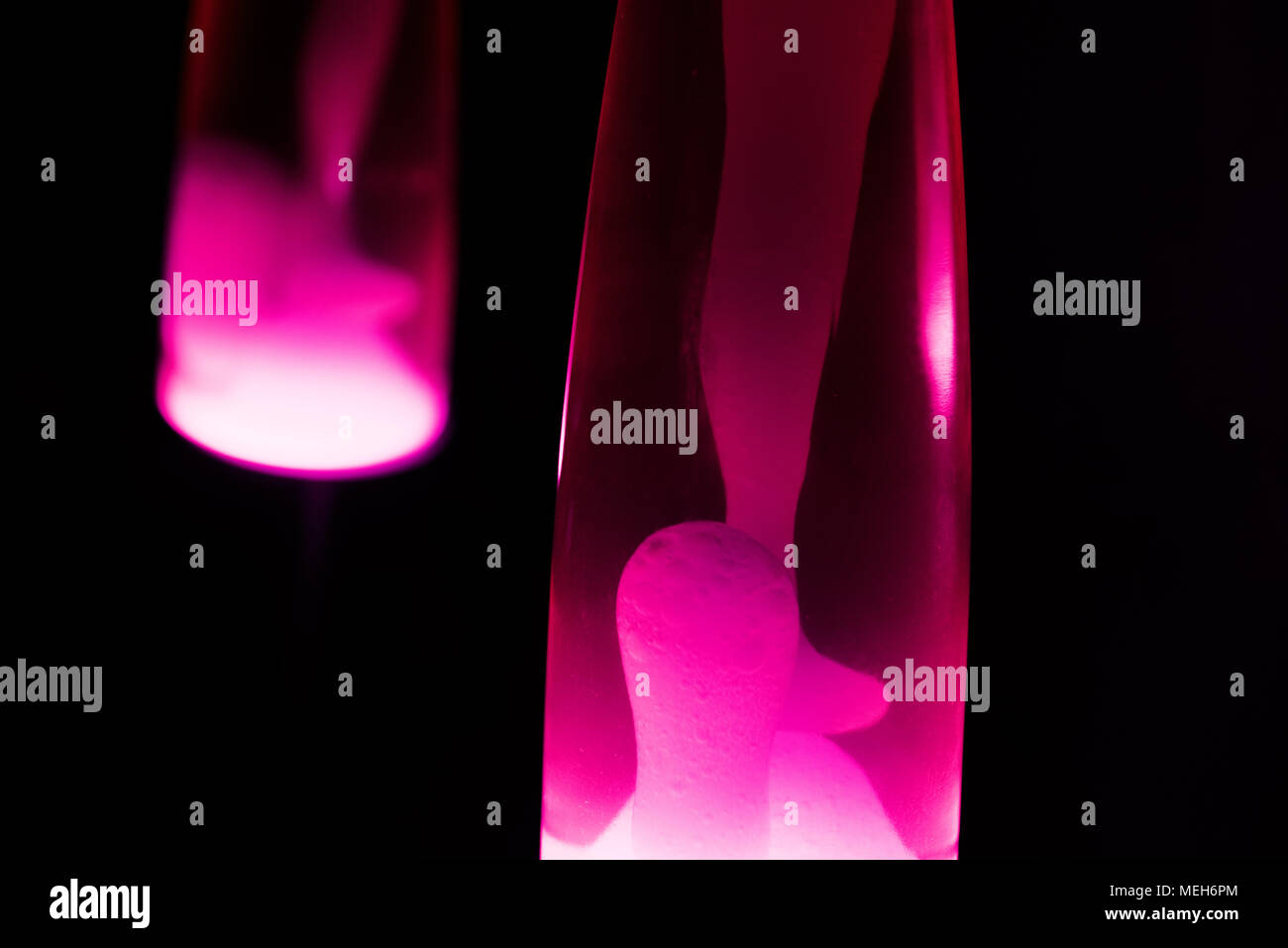 Lava lamp reflection. Abstract isolated composition on black background Stock Photo