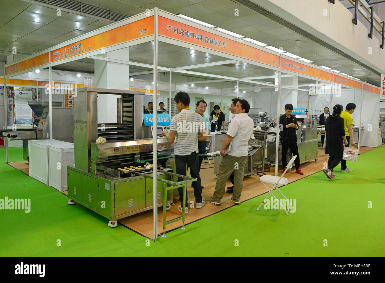 Bakery product processing machines displayed on a stand at the China