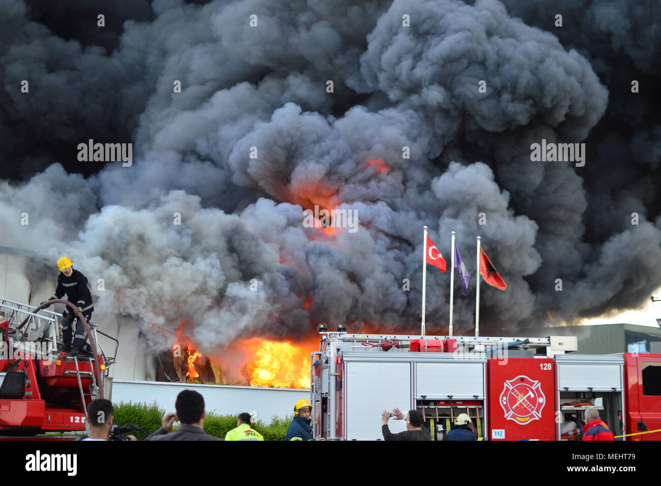 Kashar, Tirana-Albania, 22 April 2018. Huge fire burns completely a recycling company in Kashar, 10 fire-units already on the scene struggling to extinguish the flames. NO injures or fatalities are reported Credit: Antonio Cakshiri/Alamy Live News Stock Photo