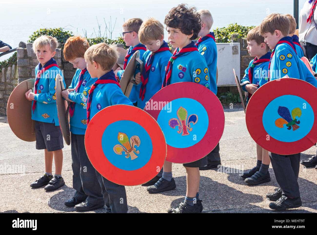 Bournemouth, Dorset, UK 22nd April 2018. Warm sunny weather as hundreds turn out to support the St George's Day scouts parade in Bournemouth. Youngsters boys and girls scouts cubs beavers celebrate Saint Georges day taking part in the procession. Beavers with their home made crafted shields made from card cardboard. Credit: Carolyn Jenkins/Alamy Live News Stock Photo