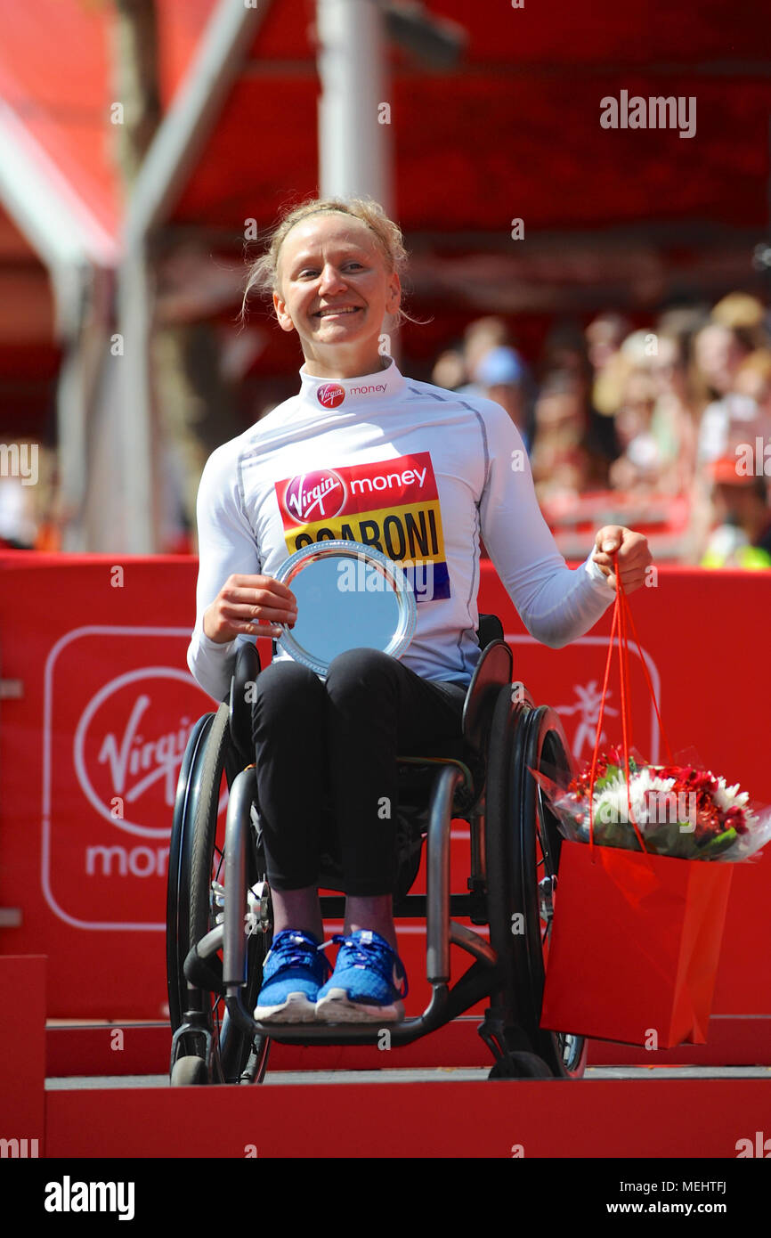 Susannah Scaroni (USA) on the podium during the prize giving ceremony for  the Virgin Money London Marathon Women's Wheelchair Race, The Mall, London,  United Kingdom. Scaroni finished third after being narrowly beaten