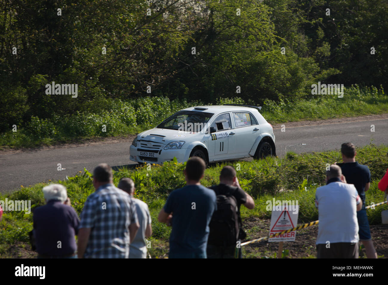 Tendring and Clacton, England. 22nd April, 2018. The first ever closed road rally to be held in England sweeps through Tendring, Essex. The trailblazing Corbeau seats rally sees 120 competitors compete across five special stages. Around 10,000 spectators cheer on the drivers. Stephanie Humphries/Alamy Live News Stock Photo