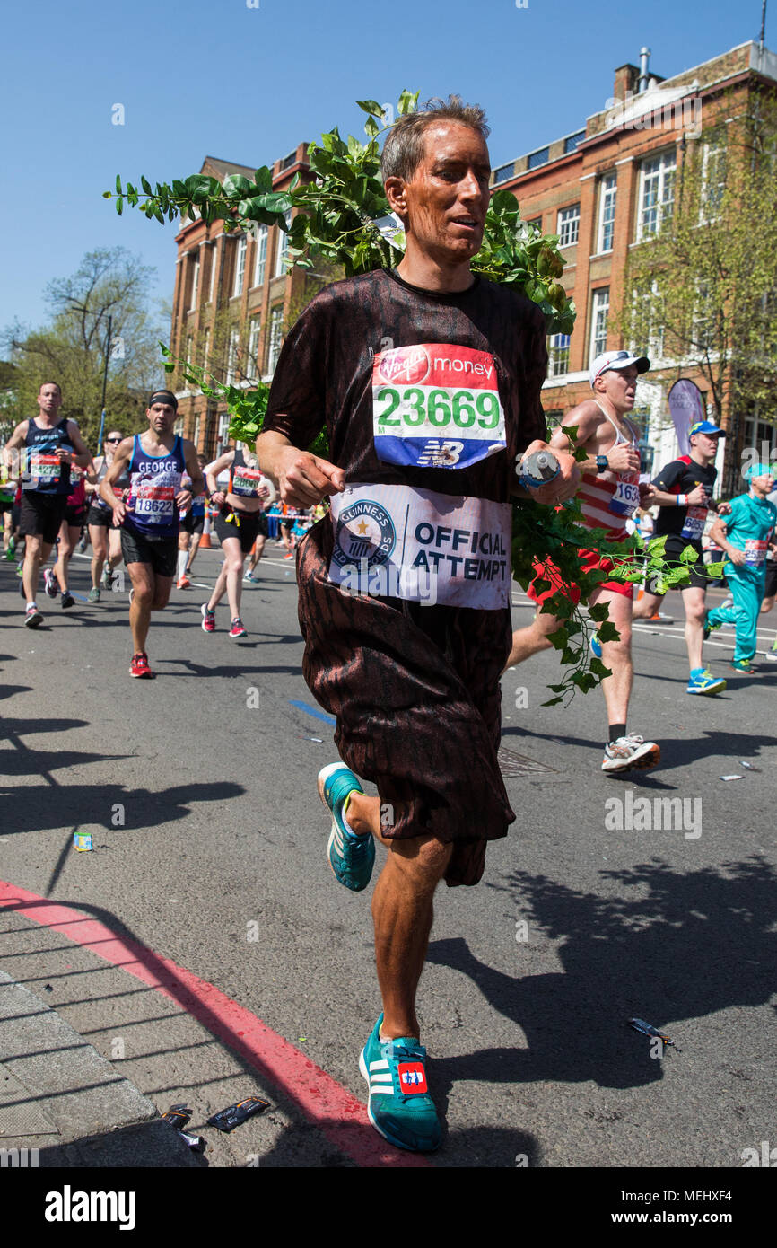 UK. 22nd April, 2018. Tim Perkins of Herne Hill Harriers, dressed as a tree, competes in the Virgin London Marathon as part of a Guinness World Record attempt. Due
