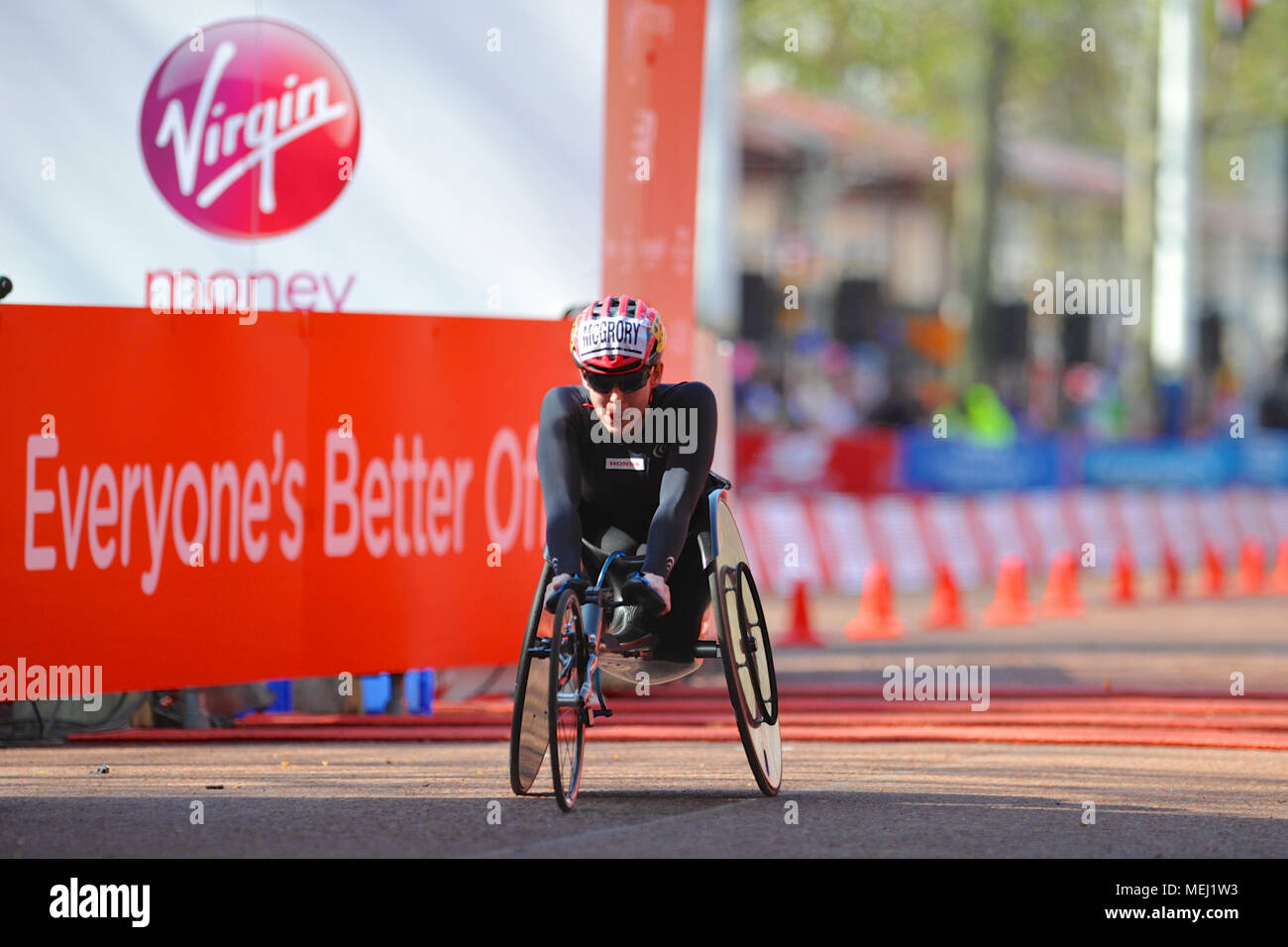 London, UK. 22nd Apr, 2018. Amanda McGrory (USA) crossing the finish line on The Mall during the Virgin Money London Marathon Women’s Wheelchair race, The Mall, London, United Kingdom.  McGrory finished in 5th place with a time of 1:43:04. Credit: Michael Preston/Alamy Live News Stock Photo