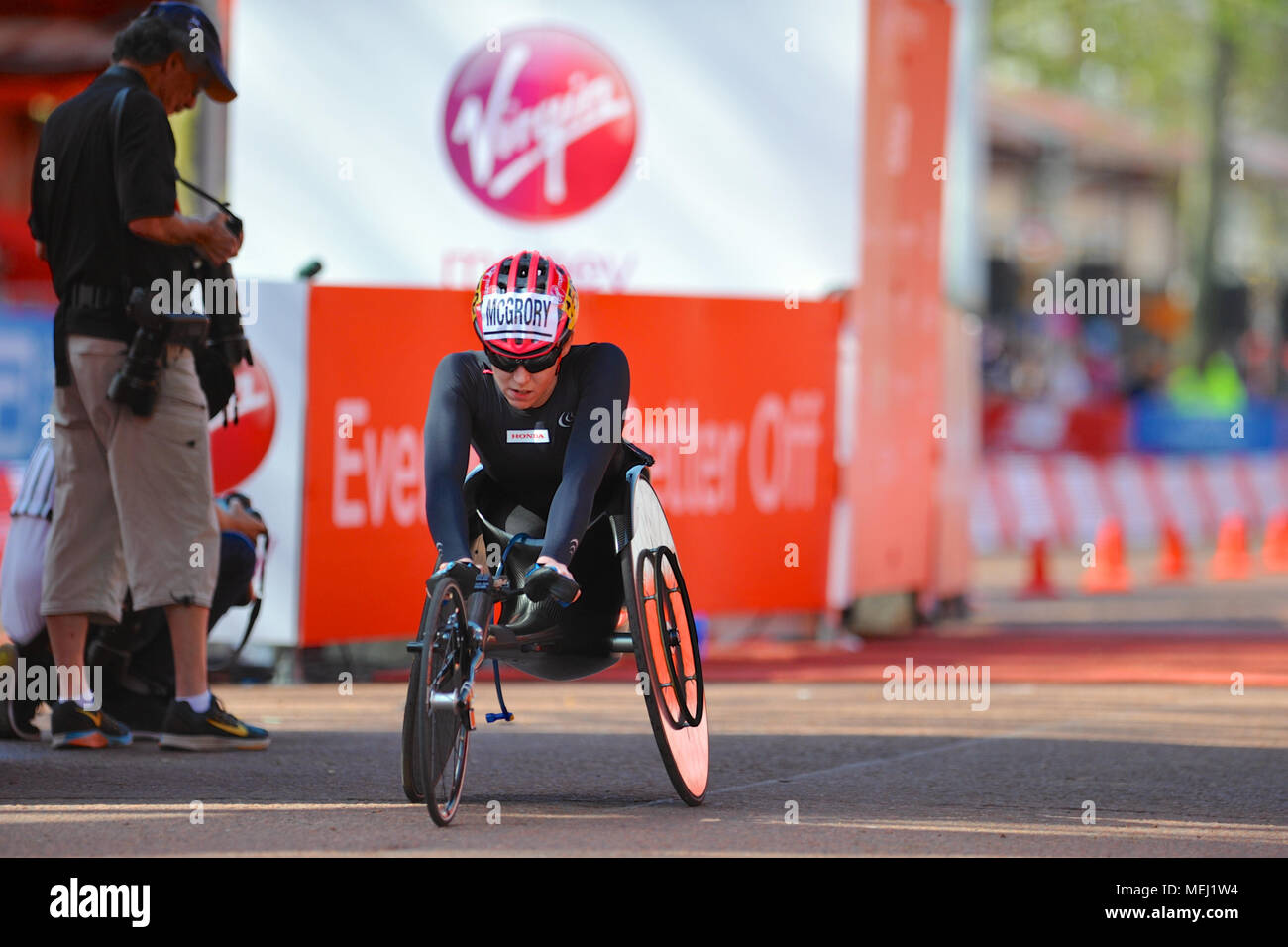 London, UK. 22nd Apr, 2018. Amanda McGrory (USA) crossing the finish line on The Mall during the Virgin Money London Marathon Women’s Wheelchair race, The Mall, London, United Kingdom.  McGrory finished in 5th place with a time of 1:43:04. Credit: Michael Preston/Alamy Live News Stock Photo