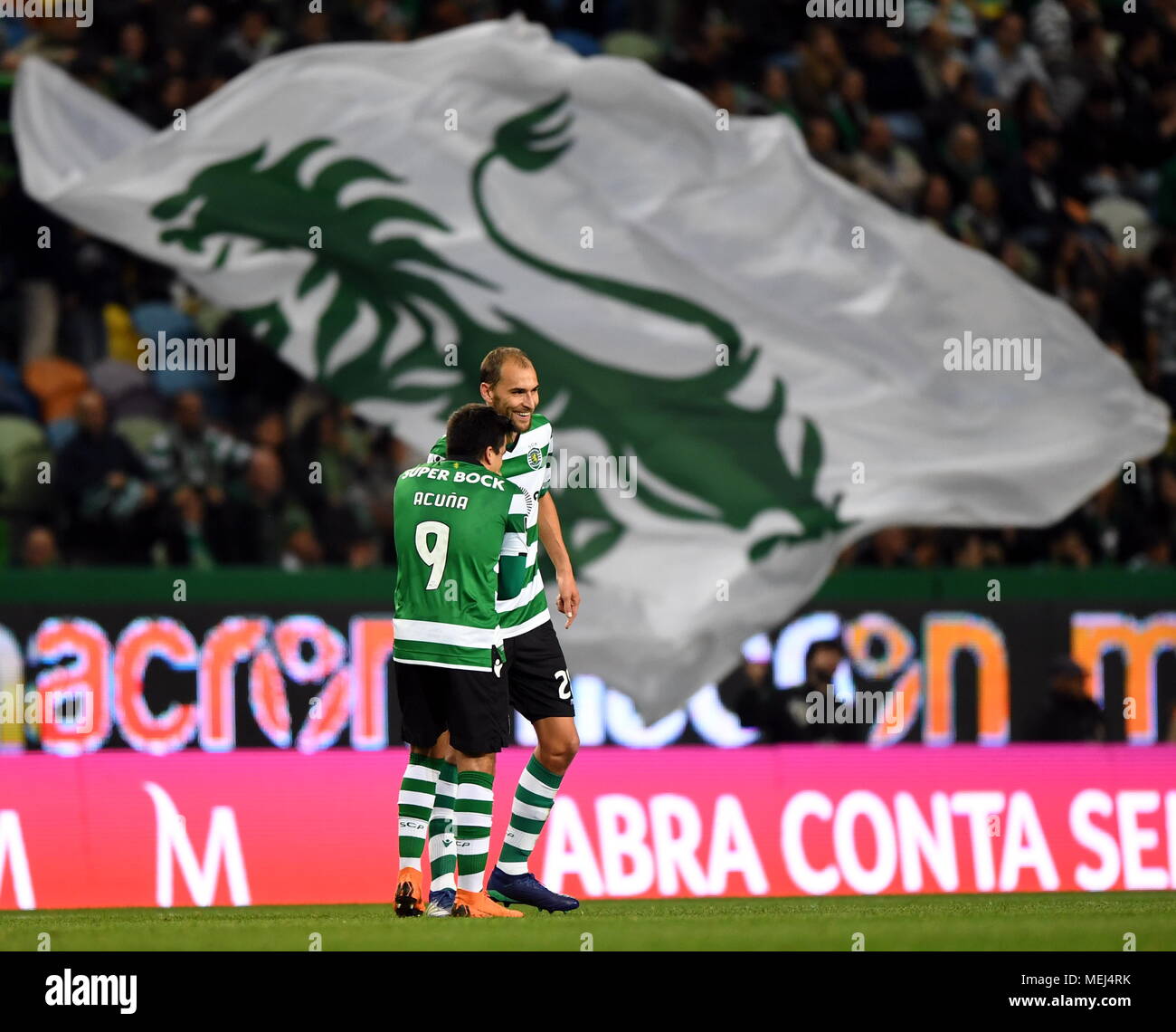 Lisbon, Portugal. 22nd Apr, 2018. Dost (R) of Sporting celebrates with 