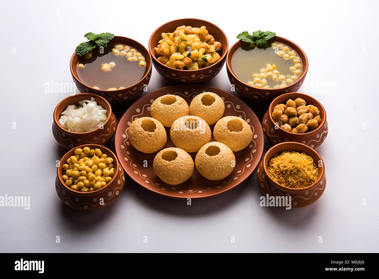 Pani Puri is Indian chat item served in a terracotta bowls and plate Stock Photo 181109214 Alamy