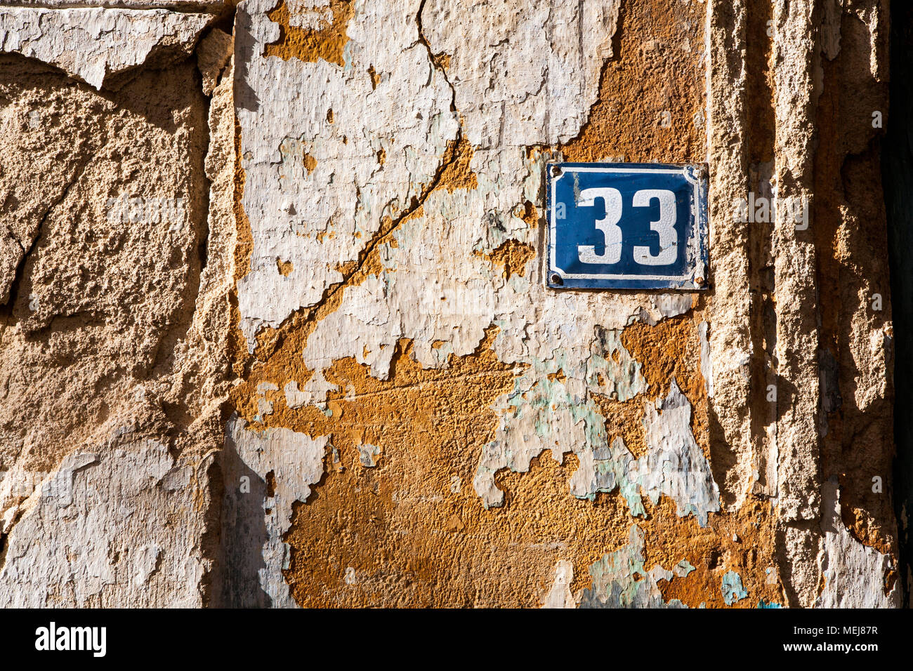 Old brick weathered wall, background, Arnea, Greece architecture Stock Photo