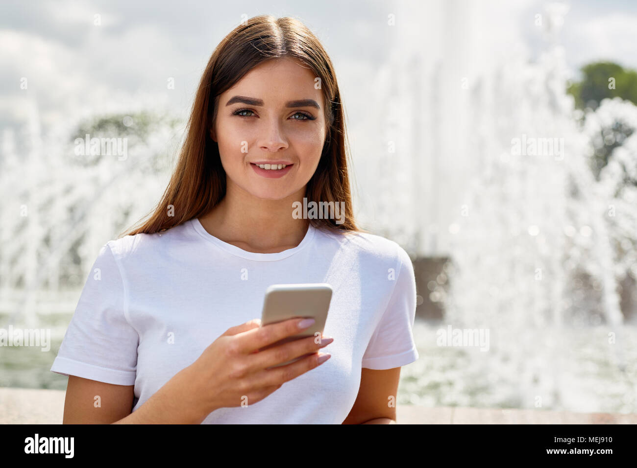 Girl with smartphone Stock Photo