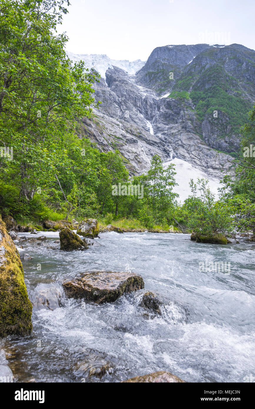 glacier Supphellebreen and its river, part of the Jostedalsbreen  National Park, Norway, near Fjaerland, riverscape with rocks Stock Photo