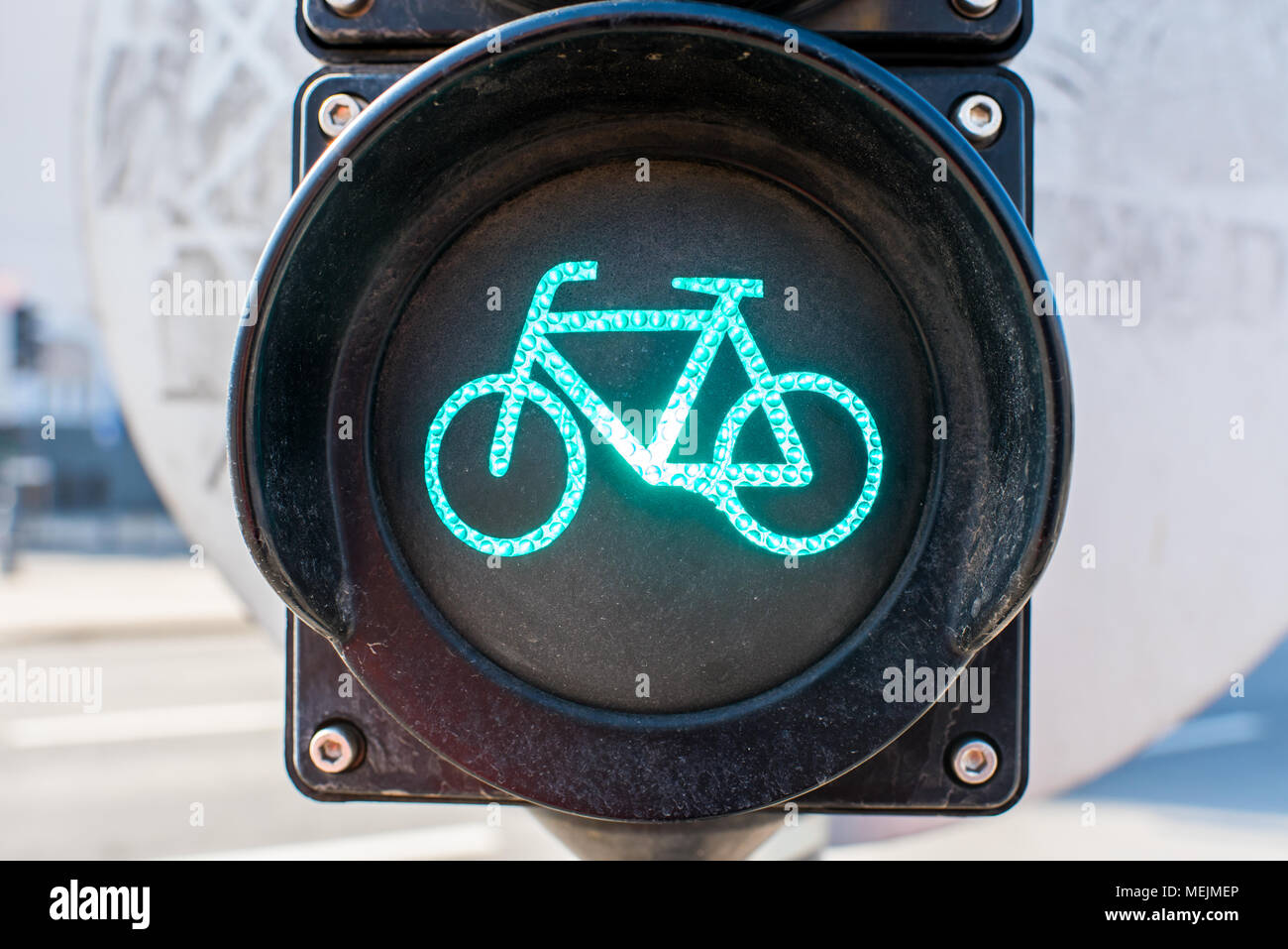 glowing traffic light in green for bicycles Stock Photo
