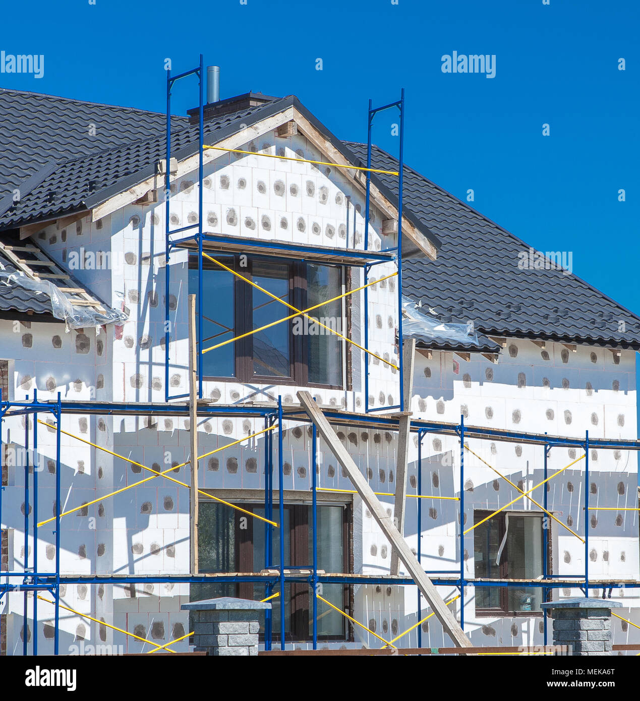 exterior insulation of building facade and walls under construction ...