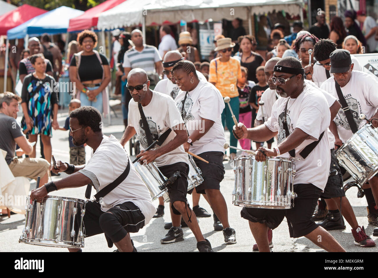 Atlanta, GA, USA - September 12, 2015:  Members of the Atlanta Ol Skool Drummers perform on the street at the 5 Arts Fest in Atlanta. Stock Photo