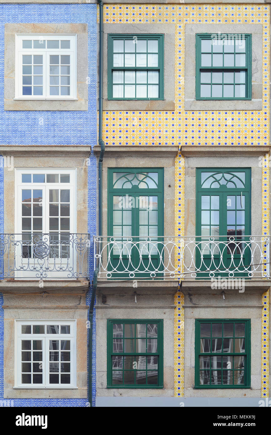 Facades of old colorful different houses in touristic district, Porto, Portugal. Stock Photo