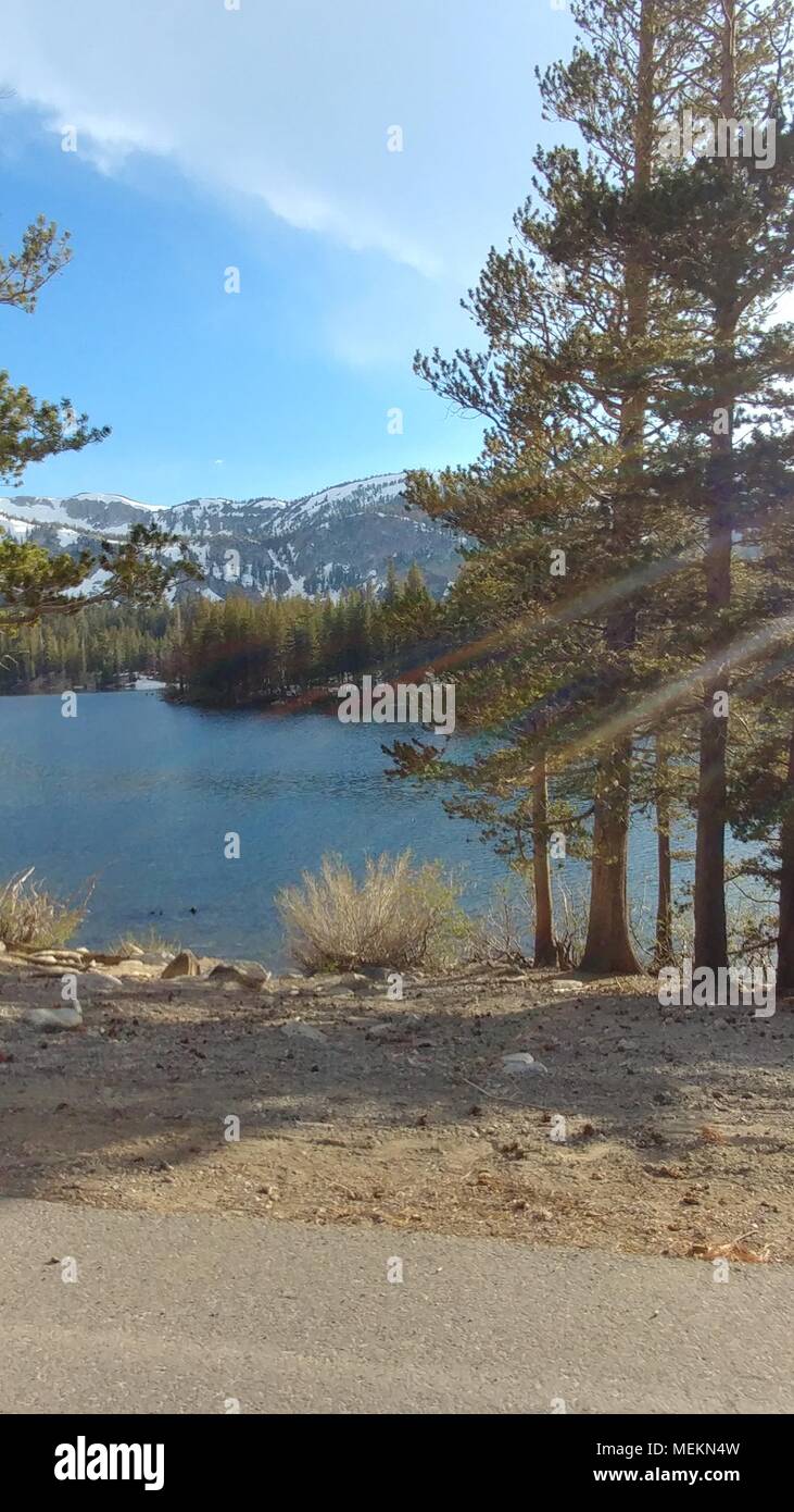 Tranquil lake sun rays hi-res stock photography and images - Alamy
