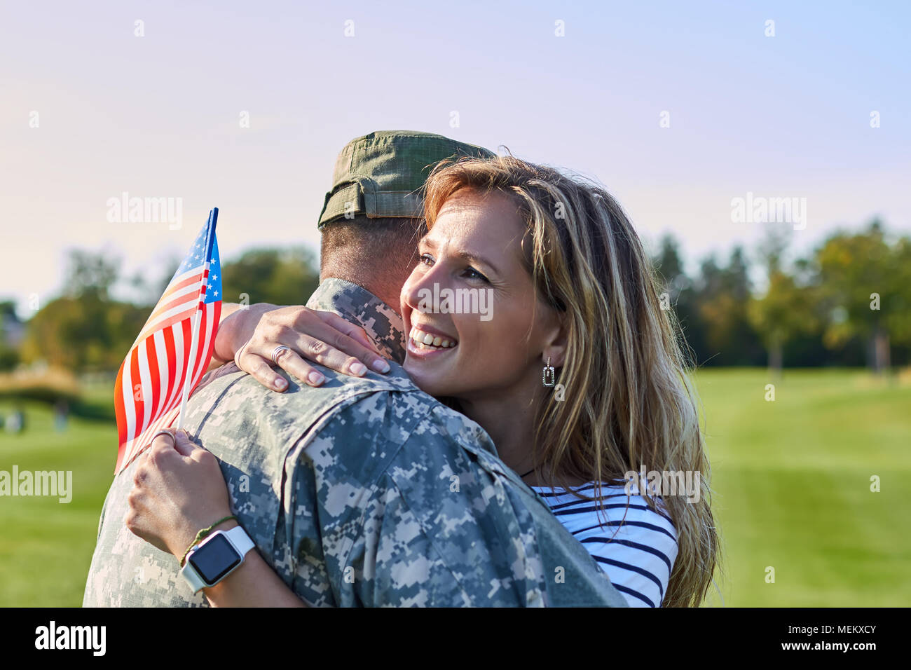 American soldier is hugging with wife. Stock Photo
