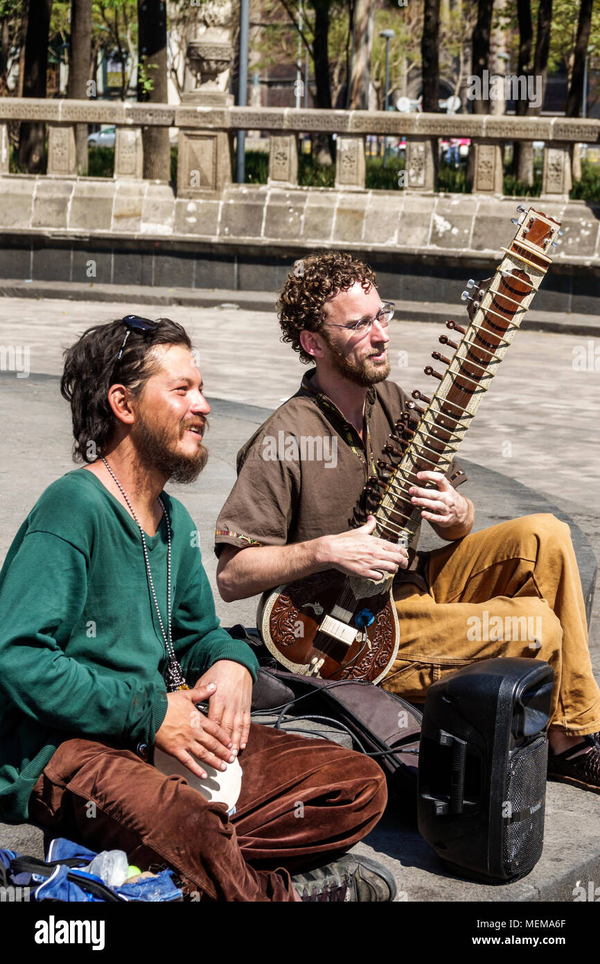 Mexico City,Mexican,Hispanic,historic Center Centre,Alameda Central,public park,man men male,street performer musician,sitar,bongo MX180304058 Stock Photo