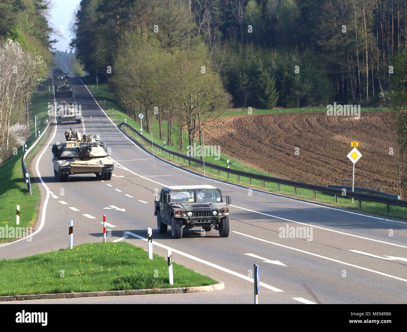 Vehicles from the 5th Squadron, 4th Cavalry Regiment, 2nd Armored Brigade Combat Team, 1st Infantry Division, conduct a tactical movement outside Grafenwoehr Training Area, Germany, April 22, 2018. The movement launched the second phase of the Joint Warfighting Assessment. The Joint Warfighting Assessment (JWA) helps the Army assess emerging concepts, integrate new technologies, and promote interoperability within the Army, with other services, U.S. allies, and partners. JWA is the only exercise venue assessing 27 concepts and capabilities while aligning with U.S. Army Europe Readiness and oth Stock Photo