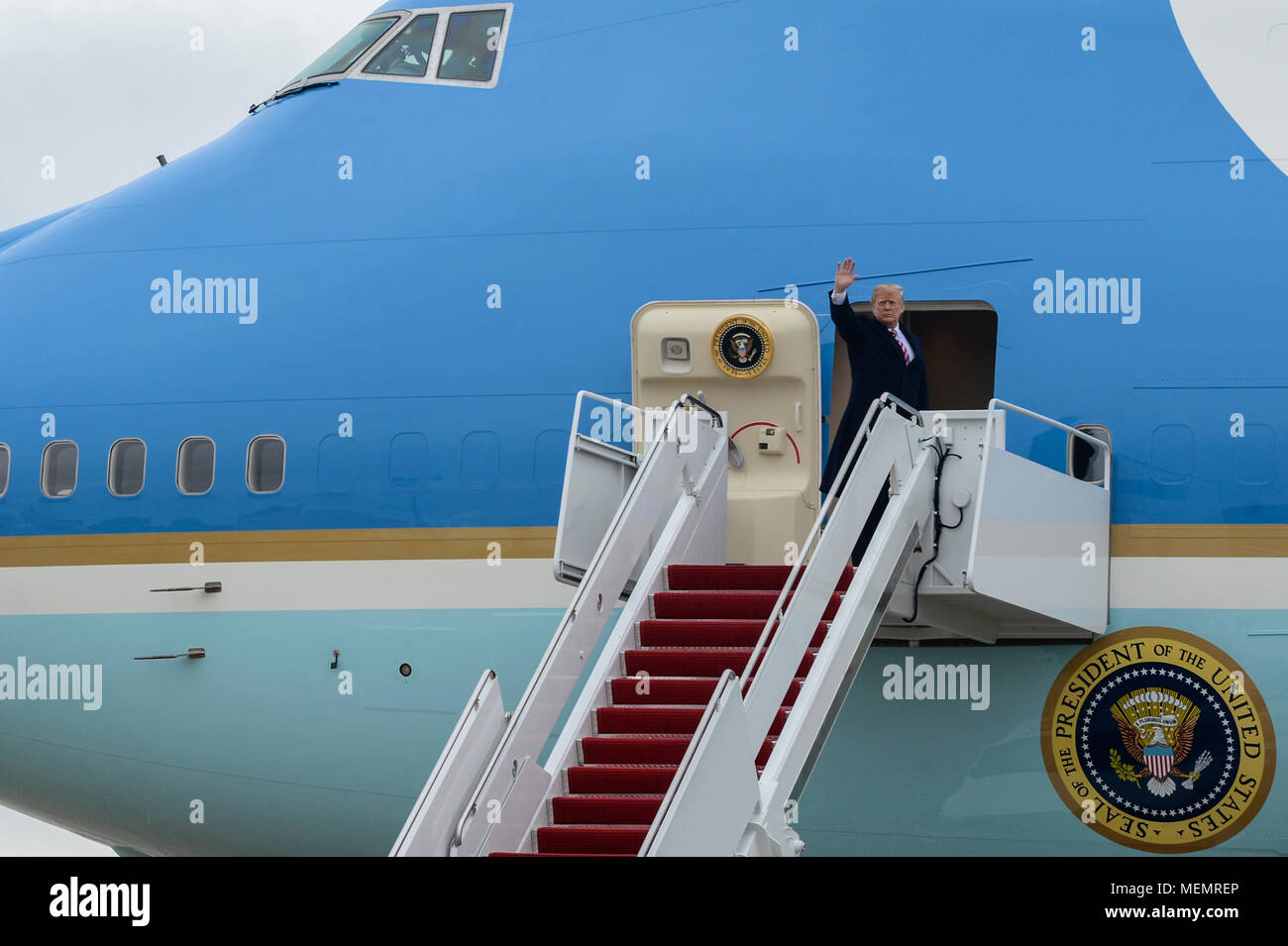 President of the United States Donald J. Trump waves to service members and guests gathered near the 89th Airlift Wing Passenger Terminal as he boards Air Force One at Joint Base Andrews, Md., April 16, 2018. The president went on to board Air Force One in route to West Palm Beach, Fla. The 89th AW provides global Special Air Mission airlift, logistics, aerial port and communications for the president, vice president, cabinet members, combatant commanders and other senior military and elected leaders as tasked by the White House, Air Force chief of staff and Air Mobility Command. (U.S. Air For Stock Photo