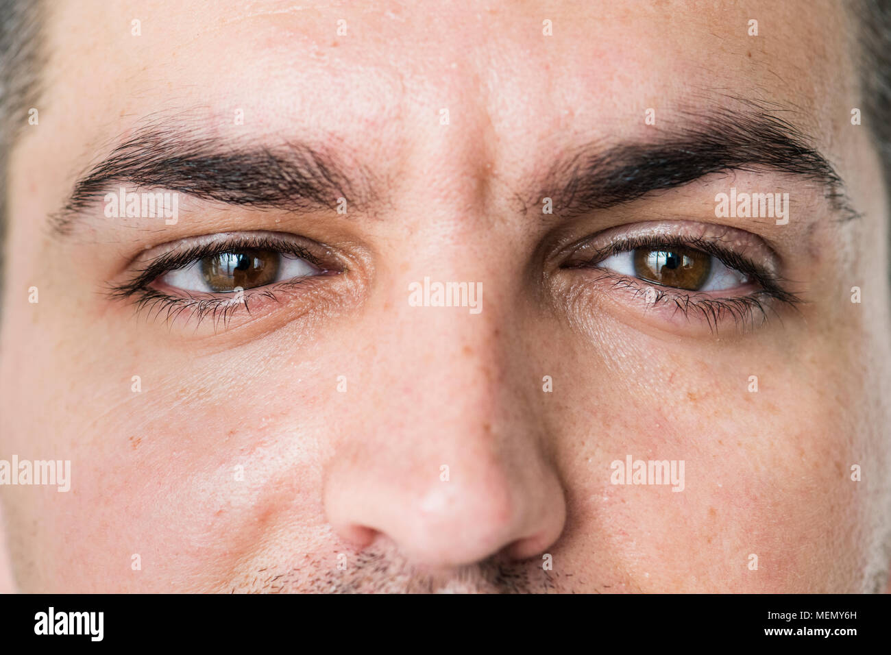 Portrait of white man closeup on eyes Stock Photo
