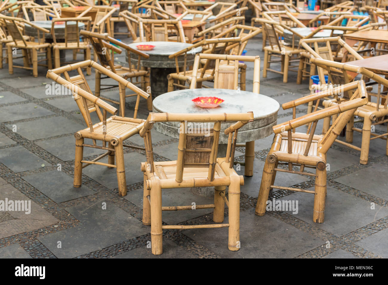 Chengdu, Sichuan Province, China - April 11, 2018 : Empty bamboo chairs and tables in people's park ancient tearoom Stock Photo