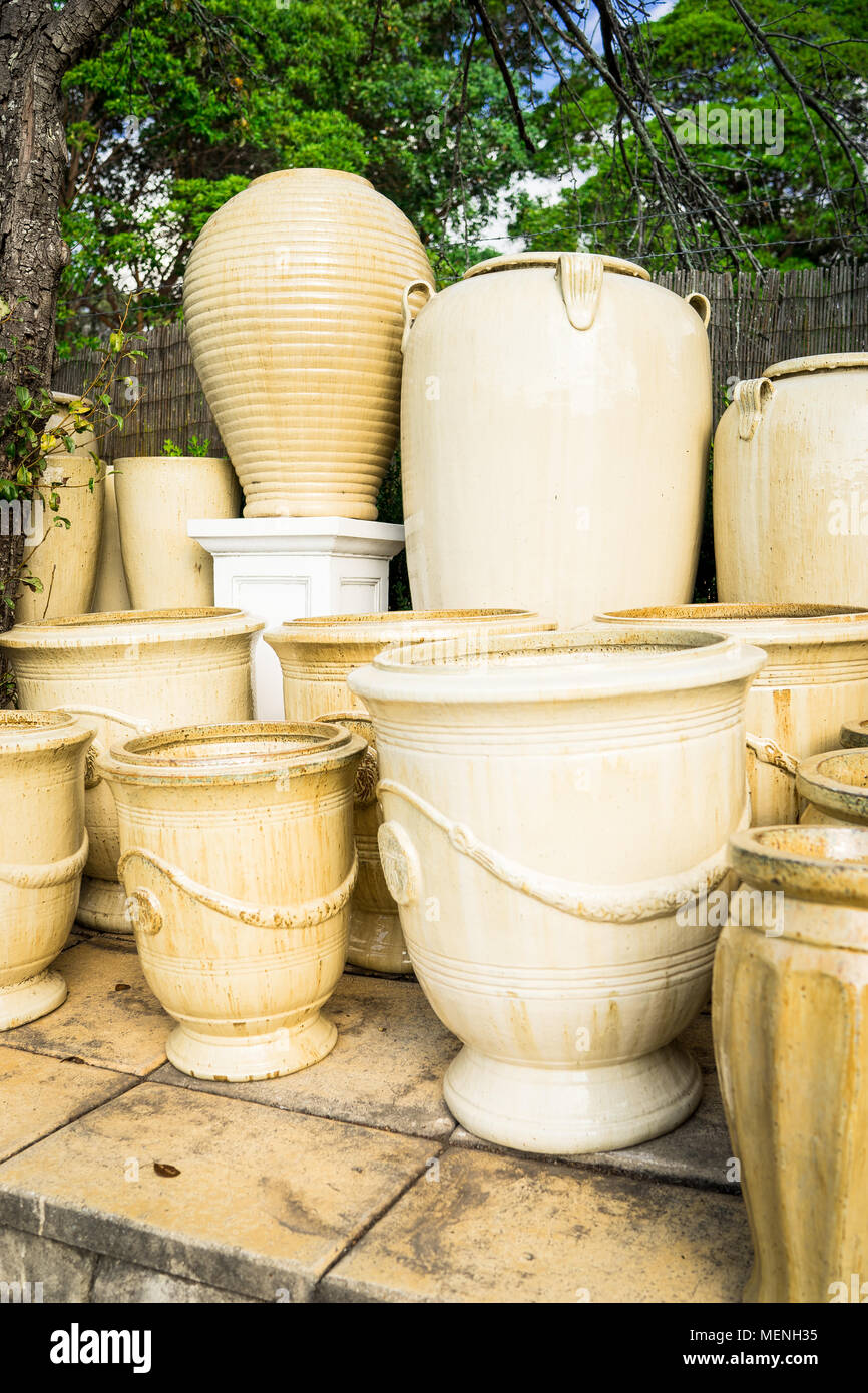 Cream coloured stone flower pots at a Plant Nursery Stock Photo Alamy