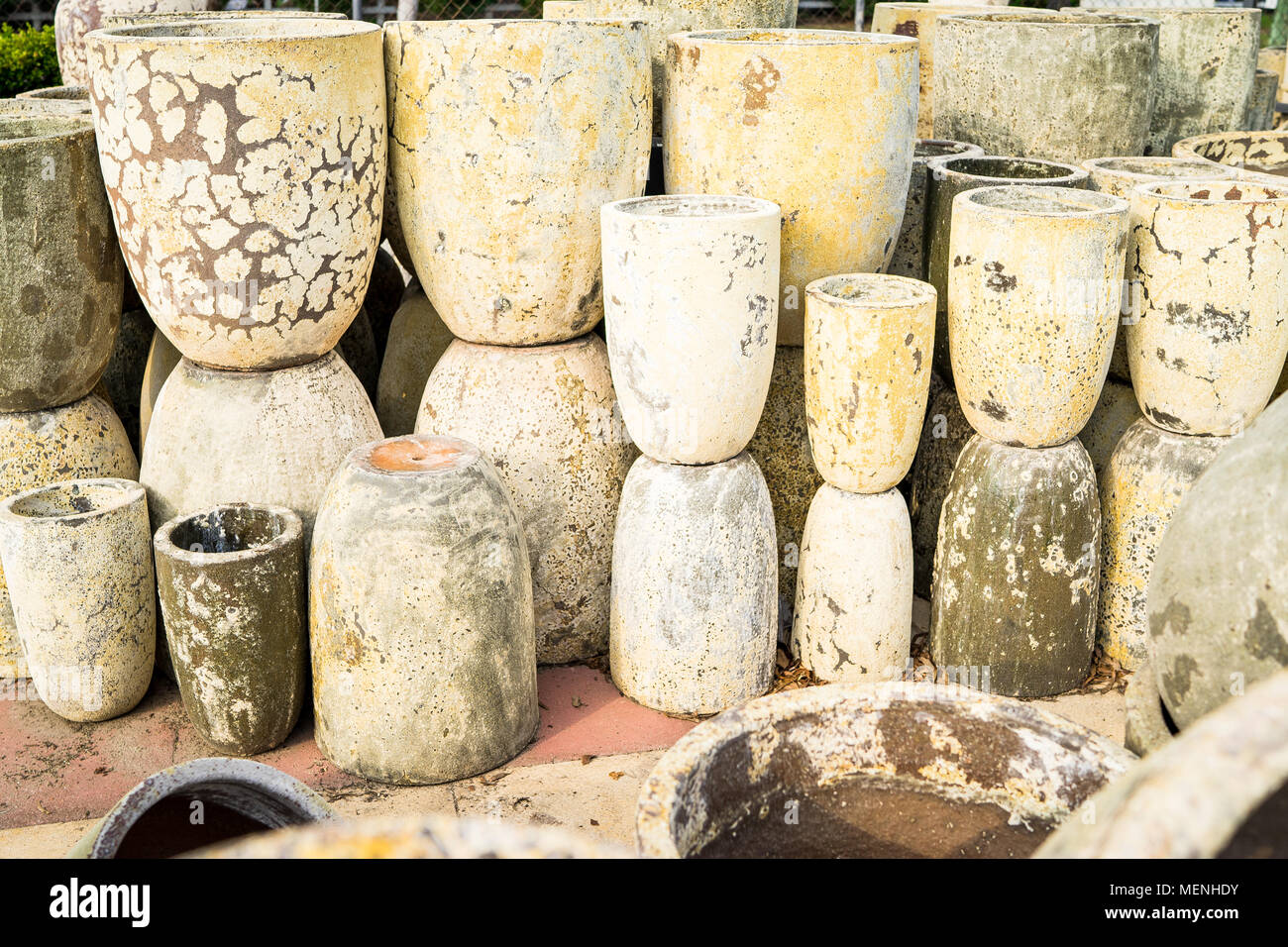 Cream coloured stone flower pots at a Plant Nursery Stock Photo Alamy