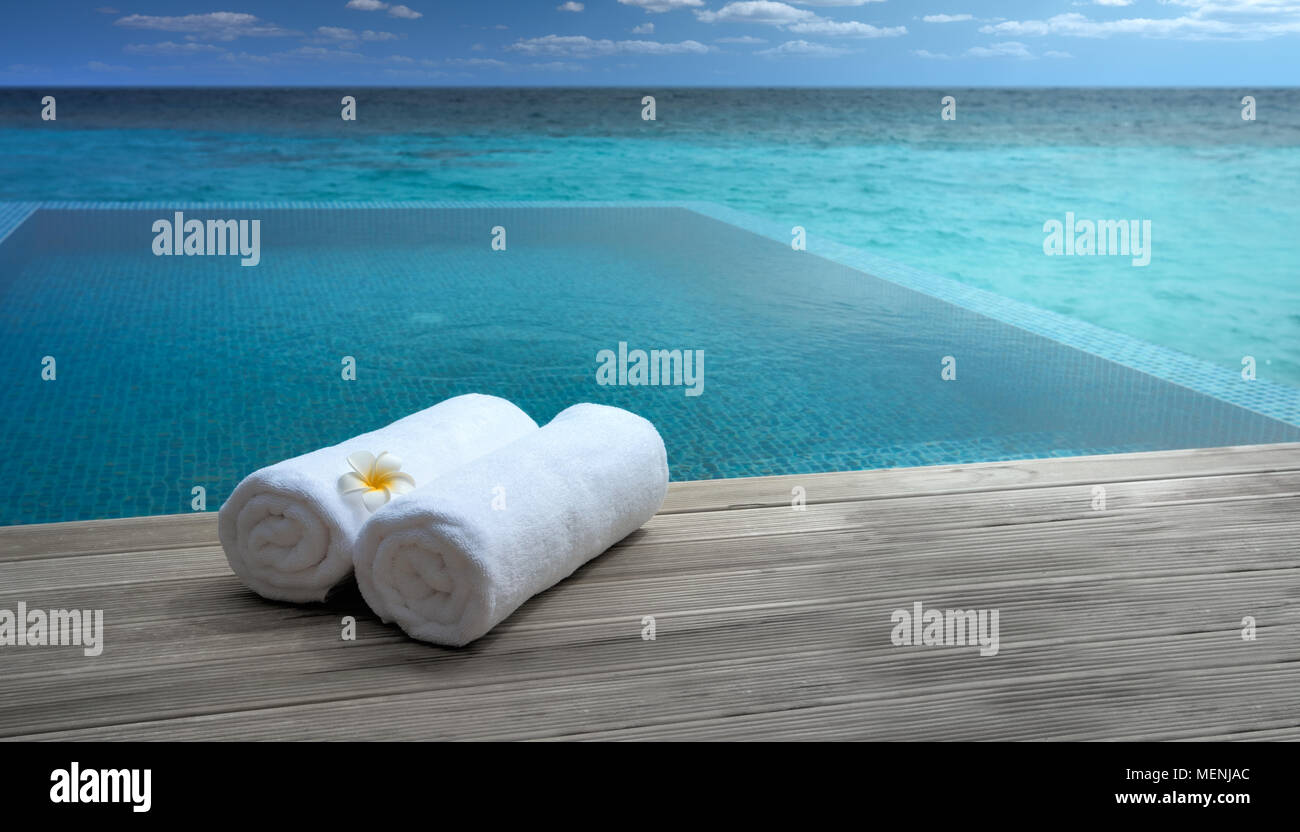towels by the pool,sea view. Stock Photo