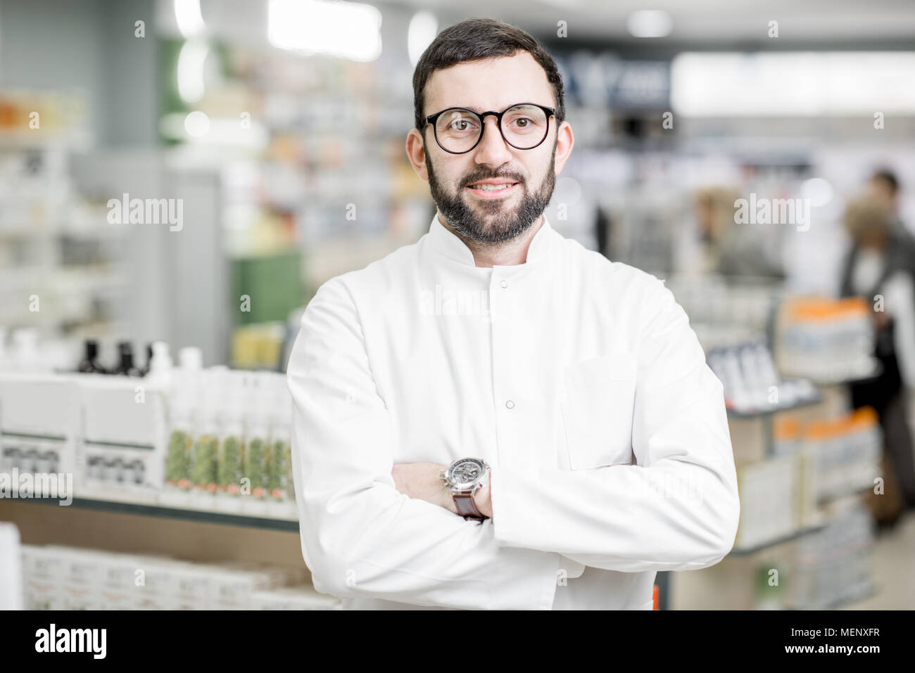 Pharmacist portrait in the pharmacy store Stock Photo
