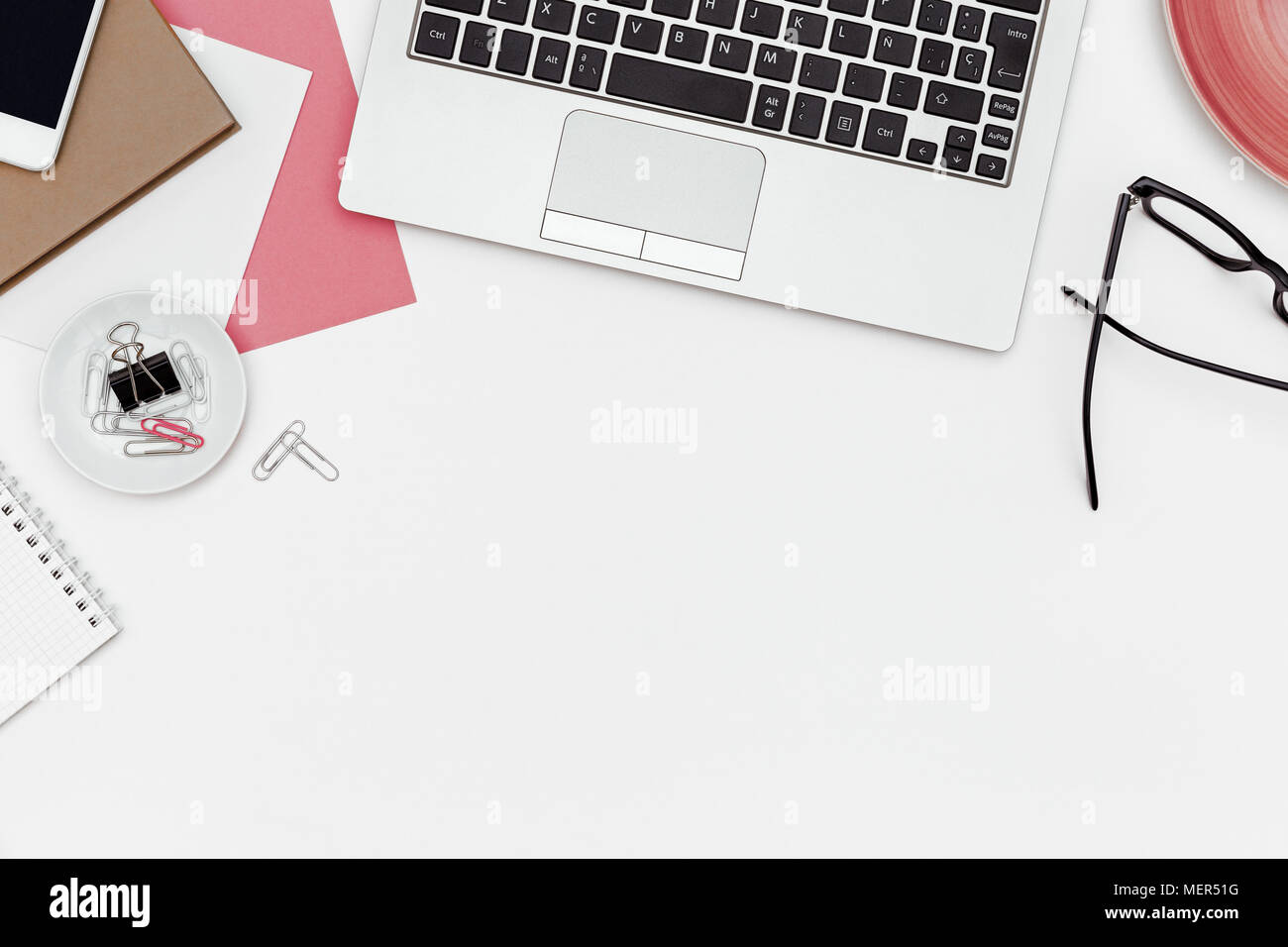Feminine business desk with copy space on white background. Flat lay Stock Photo