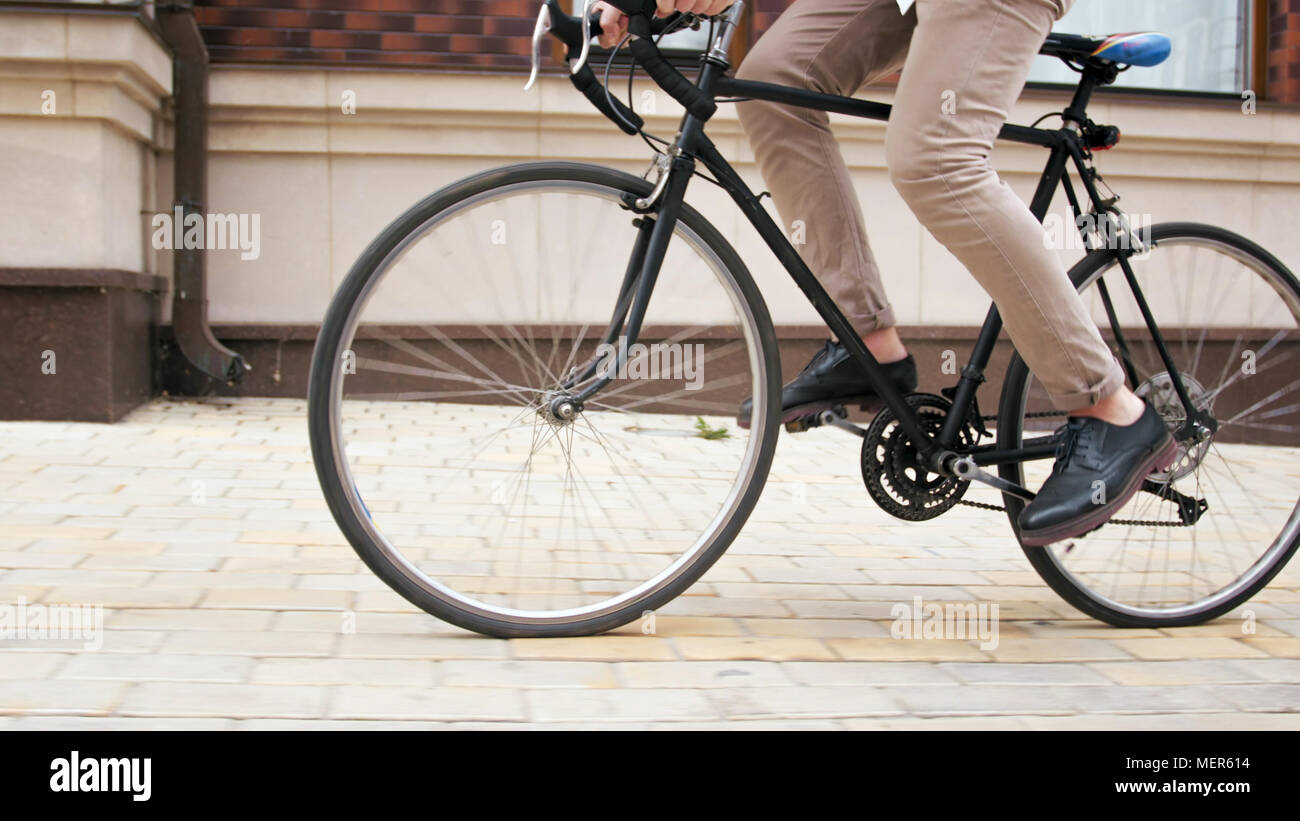 Closeup image of male feet turning retro bicycle pedals Stock Photo Alamy