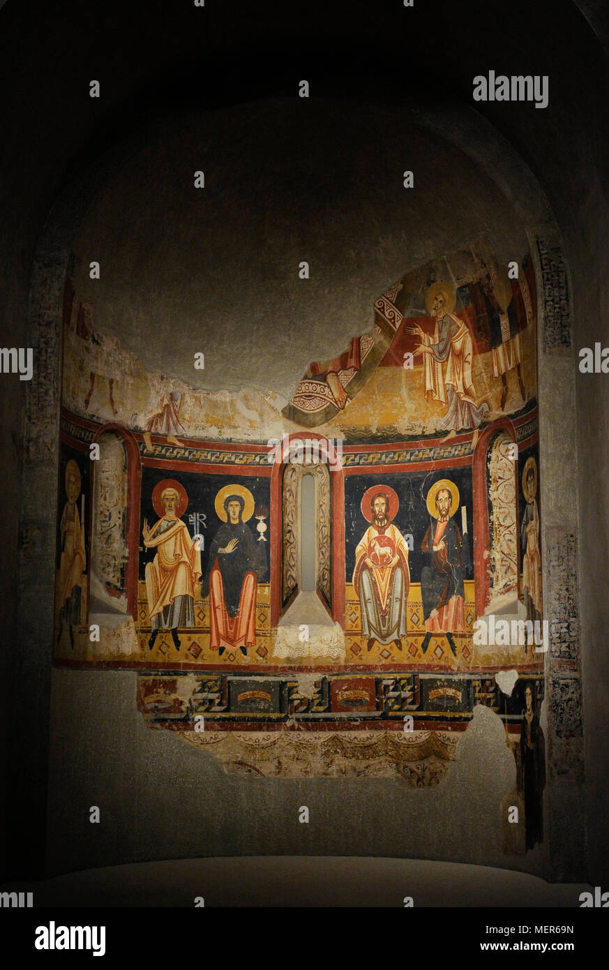 Circle of the Master of Pedret. Main apse of the Burgal (late 11th century-early 12th century). Fresco depicting Saint Peter and the Virgin with chalice (left) and Saint John the Baptist and Saint Paul (right). Romanesque. Fresco transferred to canvas. From the old Church of Sant Pere del Burgal (la Guingueta Aneu, province of Lleida, Spain). National Museum of Art of Catalonia (MNAC). Barcelona. Catalonia. Spain. Stock Photo