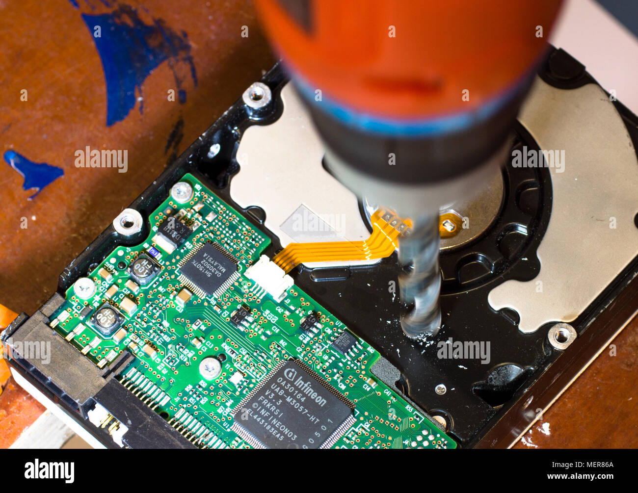 Concept picture, a distressed PC hard drive. Stock Photo