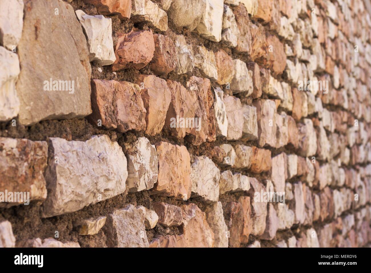 Brick wall background and texture (Spello, Umbria, Italy Stock Photo