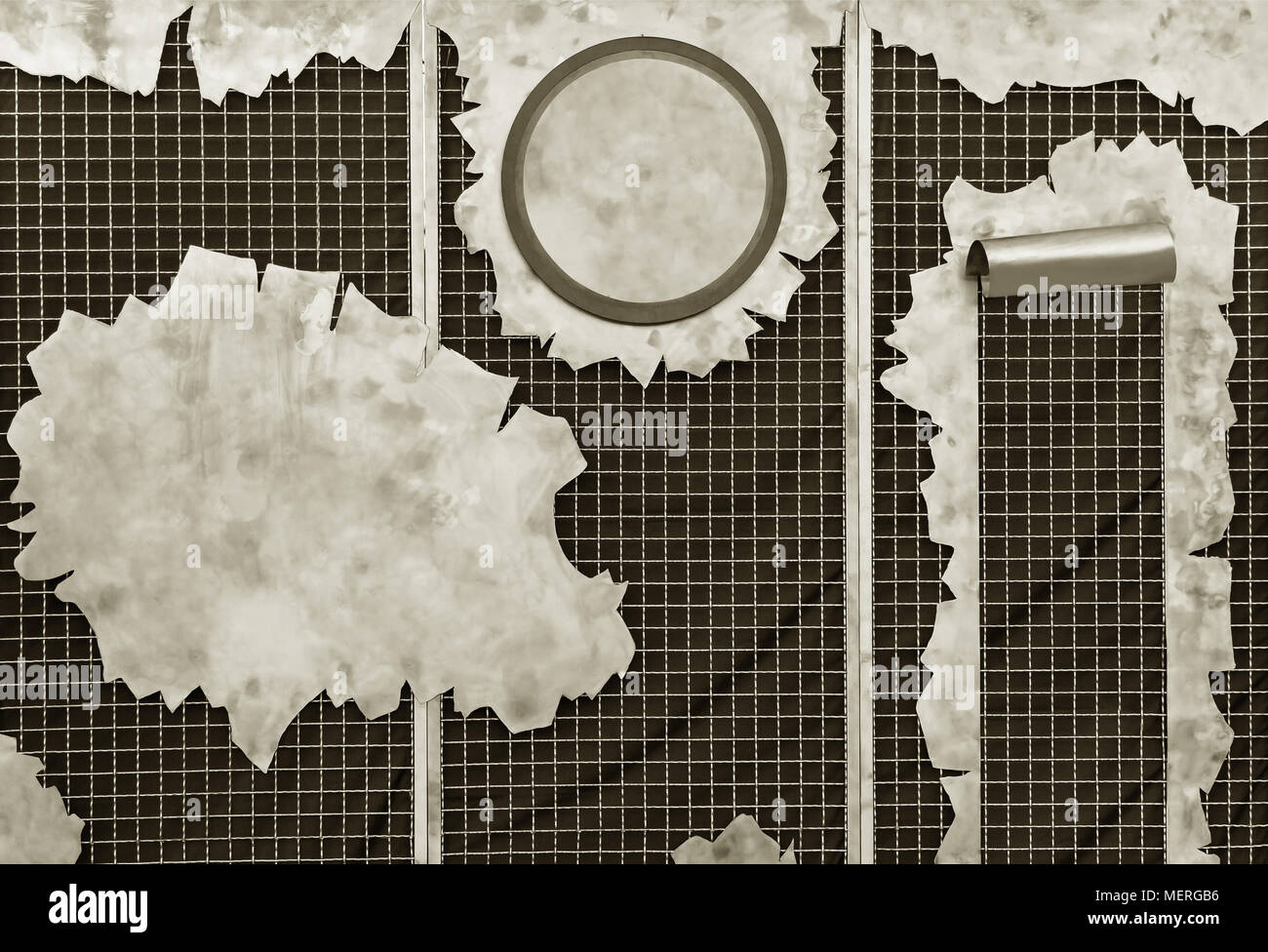 pieces of metal of different forms on a metallic grate Stock Photo Alamy