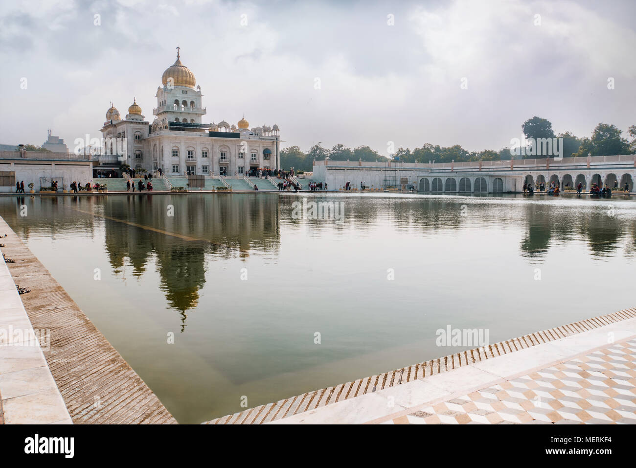 Gurdwara Bangla Sahib is the most prominent Sikh gurdwara. A large pond in front of the temple Stock Photo